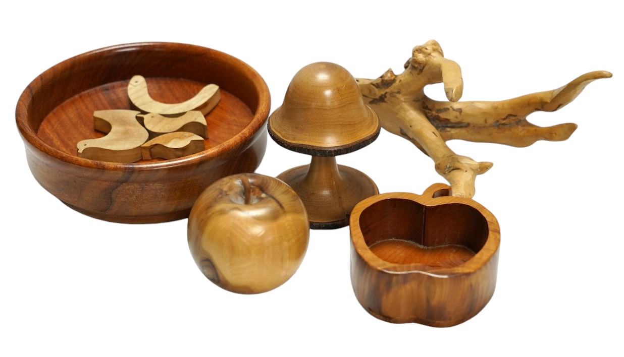 A quantity of modern treen items to include fruit bowl, puzzle and boxes & covers, one in the form of a pear, largest 23cm in diameter. Condition - mostly good